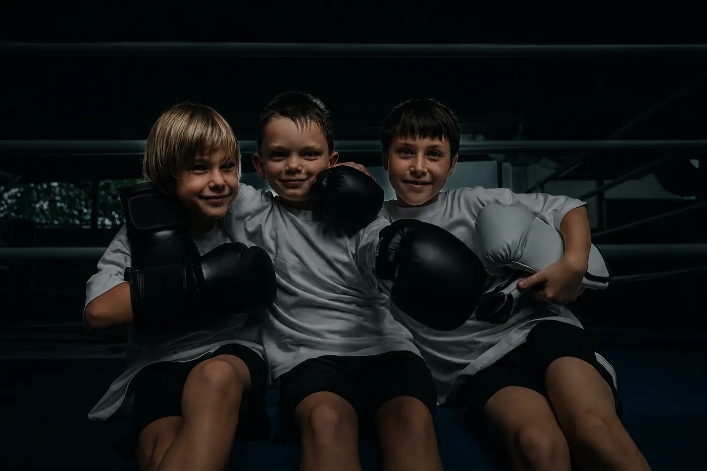Young Emperor students in training gear smiling